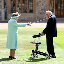 Queen Elizabeth II awards Captain Sir Thomas Moore with the insignia of Knight Bachelor at Windsor Castle on July 17, 2020 in Windsor, England.   (Photo by Chris Jackson/Getty Images)