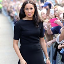 WINDSOR, ENGLAND - SEPTEMBER 10: Meghan, Duchess of Sussex meets members of the public on the long Walk at Windsor Castle after viewing flowers and tributes to HM Queen Elizabeth on September 10, 2022 in Windsor, England. Crowds have gathered and tributes left at the gates of Windsor Castle to Queen Elizabeth II, who died at Balmoral Castle on 8 September, 2022. (Photo by Chris Jackson/Getty Images)