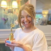 Acala Stem founder Leanne Savage with one of her many industry awards.