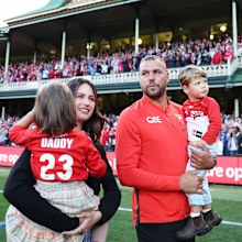 SYDNEY, AUSTRALIA - AUGUST 27:  Lance Franklin of the Swans farewells the crowd with his wife Jesinta Franklin and children during a lap of honour during the round 24 AFL match between Sydney Swans and Melbourne Demons at Sydney Cricket Ground, on August 27, 2023, in Sydney, Australia. (Photo by Matt King/AFL Photos/via Getty Images )
