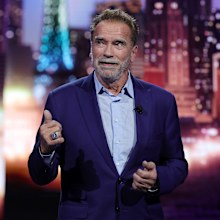 Actor Arnold Schwarzenegger speaks during a keynote address by Chairman of the Board of Management of BMW AG Oliver Zipse at CES 2023 at The Pearl concert theater at Palms Casino Resort on January 04, 2023 in Las Vegas, Nevada. CES, the world's largest annual consumer technology trade show, runs from January 5-8 and features about 3,100 exhibitors showing off their latest products and services to more than 100,000 attendees. 