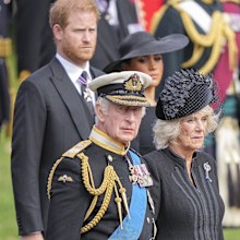 King Charles III, Camilla, the Queen Consort, Meghan, Duchess of Sussex, and Prince Harry watch as the coffin of Queen Elizabeth II is placed into the hearse following the state funeral service in Westminster Abbey in central London Monday Sept. 19, 2022. 