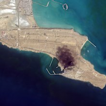In this satellite photo from Planet Labs PBC, smoke rises over Konarak Naval Basin, Iran, March 1, 2026.  