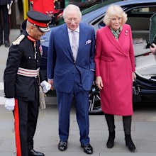King Charles III and Queen Camilla are greeted by Lord-Lieutenant of Greater London Sir Kenneth Olisa for their visit to Turquoise Mountain's 20th anniversary exhibition at the The Garrison Chapel in Chelsea Barracks on February 11, 2026 in London.