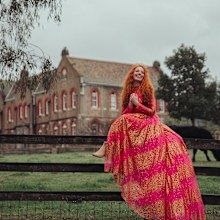 Emma Watkins poses for the Ovarian Cancer Research Foundation's (OCRF) Frocktober campaign.