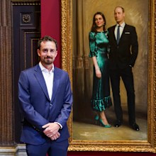 Award-winning portrait artist, Jamie Coreth poses in front of his painting of Britain's Prince William and Kate, Duchess of Cambridge as it is revealed to the public for the first time, in Cambridge, England, Thursday June 23, 2022.