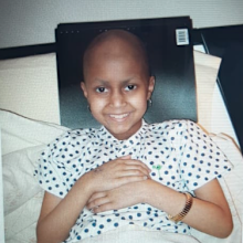 Lena Mishra in hospital being treated for brain cancer.