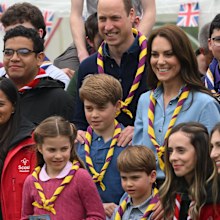 Catherine, Princess of Wales, Prince William, Prince of Wales, Prince George of Wales, Prince Louis of Wales and Princess Charlotte of Wales pose for a group pictures with volunteers who are taking part in the Big Help Out, during a visit to the 3rd Upton Scouts Hut in Slough on May 8, 2023