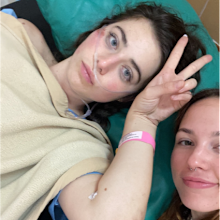 Jordon Hunt (left) in hospital after a scooter accident in Bali.