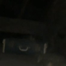 Suitcase in attic 1920s home