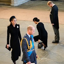 LONDON, ENGLAND - SEPTEMBER 14: Catherine, Princess of Wales, Prince William, Prince of Wales, Meghan, Duchess of Sussex and Prince Harry, Duke of Sussex pay their respects in The Palace of Westminster after the procession for the Lying-in State of Queen Elizabeth II on September 14, 2022 in London, England. Queen Elizabeth II's coffin is taken in procession on a Gun Carriage of The King's Troop Royal Horse Artillery from Buckingham Palace to Westminster Hall where she will lay in state until th