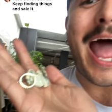 man flips trash finds money and ring