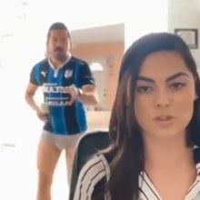 Man in underpants gets caught in girlfriend's conference call.