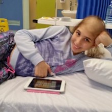 Belle Borgia in hospital during cancer treatment.
