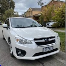 Stolen white Subaru