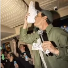 Andy Lee doing a shoey at the opening of Old Mates bar in New York