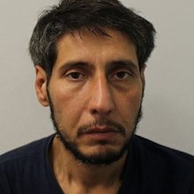 A mugshot released by UK police after Husseini failed to appear in court last month, however, has exposed his true appearance - and it's nothing similar to Schwimmer.