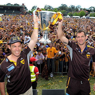 <b>After pulverising Sydney to claim back-to-back flags at the MCG on Saturday, Hawthorn's stars enjoyed the spoils of victory, celebrating at a special fans' day on Sunday.</b><br/><br/>Thousands of adoring Hawks supporters decked out in gold and brown packed into the club's spiritual home at Glenferrie Oval to salute the 22 players as they were presented on stage with the the AFL Grand Final Cup and their winning medals dangling around their necks.<br/><br/>Check out or gallery of Hawthorn's day of delight.