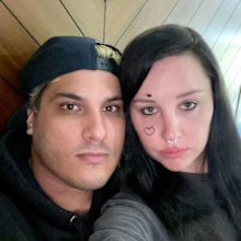 Amanda Bynes and fiancé Paul Michael.
