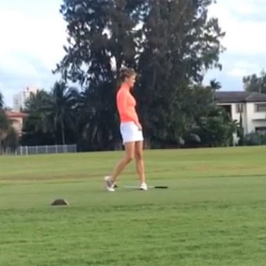 Click through to watch a video of her actually hitting the ball too long.