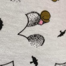 Unusual pattern on baby jumper. 