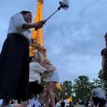 Paris proposal stranger with selfie stick