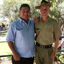 Scott (right) was placed into a medically-induced coma after suffering a brain bleed.