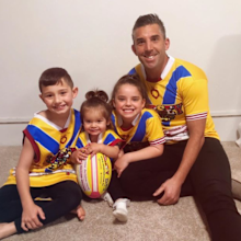 Braith Anasta and children wearing jerseys
