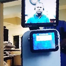 A picture released by Mr Quintana's grand daughter shows the robot doctor who came to his hospital room to tell him via video link he would soon die.