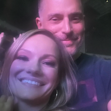 Joe Manganiello and Caitlin O'Connor smiling together in a photo.