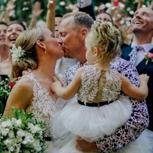 Mel Schilling with husband Gareth Brisbane and daughter Maddie on their wedding day.