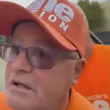 The One Nation volunteer attempted to grab James Paterson's phone after realising their conversation was being filmed.