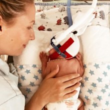 Premmie baby arlo mum hand hold