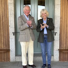 Prince Charles and the Duchess of Cornwall, joining in 'Clapping for our Carers' outside the front door of their home at Birkhall in Balmoral, Scotland