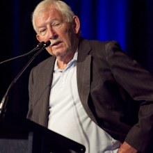 Sir Ron Brierley has reportedly been charged with possessing child abuse material.