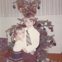 Carine and Chris McCandless share a Christmas hug. The pair were close in age with a three-year gap between them.