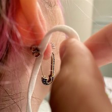 The strap of the mask had been directly pierced into Sheridan's ear.