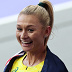 PARIS, FRANCE - AUGUST 10: Silver medalist Jessica Hull of Team Australia celebrates following the Women's 1500m Final on day fifteen of the Olympic Games Paris 2024 at Stade de France on August 10, 2024 in Paris, France. (Photo by Cameron Spencer/Getty Images)