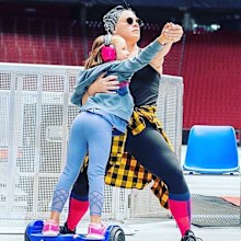 Pink poses with her daughter Willow during her tour.