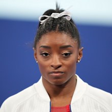 TOKYO, JAPAN - JULY 27: Simone Biles of Team US reacts during the Women's Team Final of the Tokyo 2020 Olympic Games at Ariake Gymnastics Centre in Tokyo, Japan on July 27, 2021. 