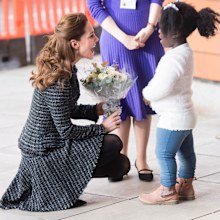 Kate accepting a posy from Anna-Victoria, nine. 