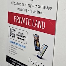 A sign at Bunnings in Balgowlah in Sydney's north urged customers to register via an app, even if they want to use the two hours of free parking.