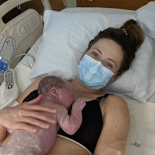 Jessica Johnson holds her baby daughter shortly after giving birth in May.