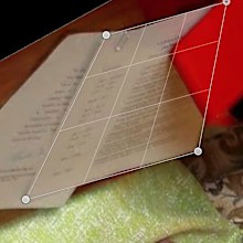 He explains the text on the papers can be read with the right software.