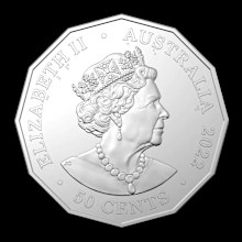 The tiny dots on this coin are a secret message that needs to be decoded.