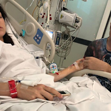 With partner Nathan during hospital treatment.