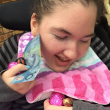 Her mother says she knows her daughter is 'in there' from her beautiful smile.