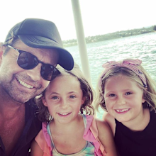 Jacobs with his daughters Isabella and Francesca.