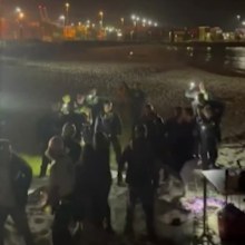 A DJ who is accused of turning up the music instead of stopping it at an early morning Fremantle beach bash has been charged.