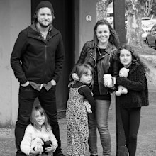 Daniel Lewis with his partner and three daughters